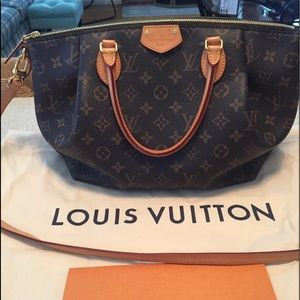 Authentic Louis Vuitton.